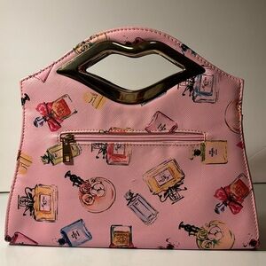 Lip handle crossbody or handheld bag. Perfect for teens who love fashion